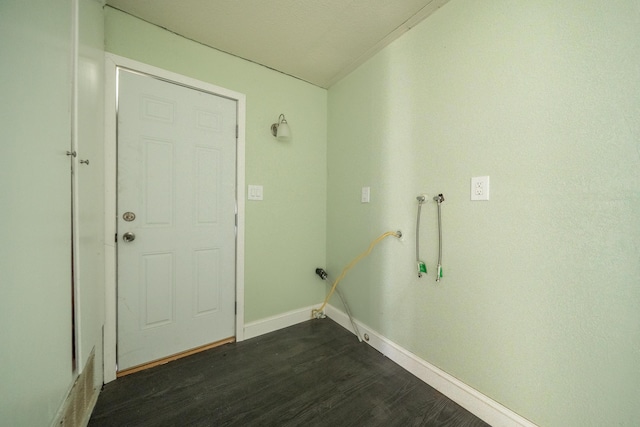 1430 Oakdale Ln, Redding, CA 96003 - washroom with dark wood finished floors and washer hookup