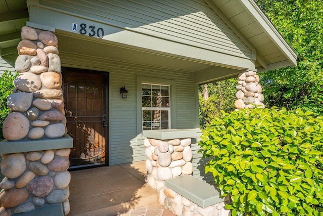 830 W St, Redding, CA 96001 - doorway to property featuring covered porch