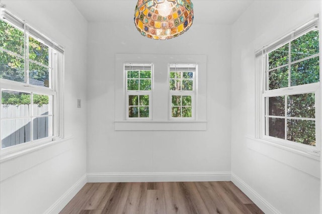 830 W St, Redding, CA 96001 - empty room with wood finished floors