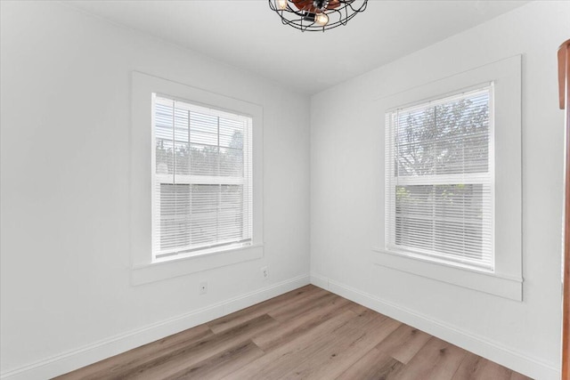 830 W St, Redding, CA 96001 - unfurnished room with healthy amount of natural light and light wood-type flooring