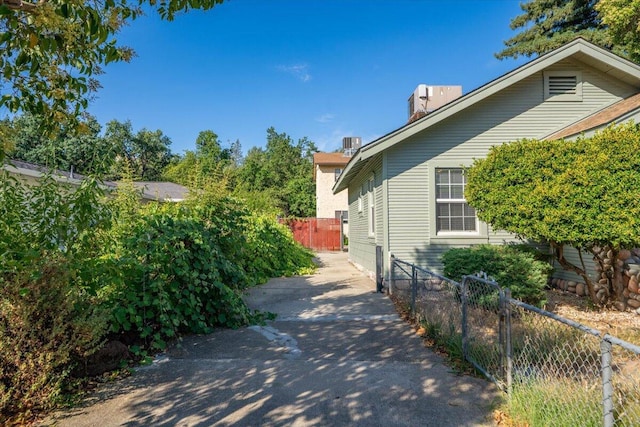 830 W St, Redding, CA 96001 - view of home's exterior with a chimney