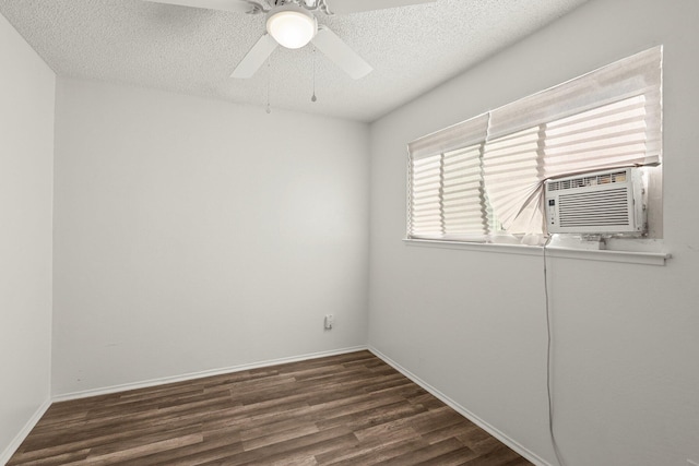 2092 Phobos Ct, Redding, CA 96002 - spare room featuring a textured ceiling, dark wood-style floors, and ceiling fan