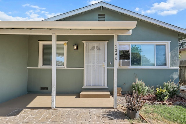 2092 Phobos Ct, Redding, CA 96002 - doorway to property featuring stucco siding
