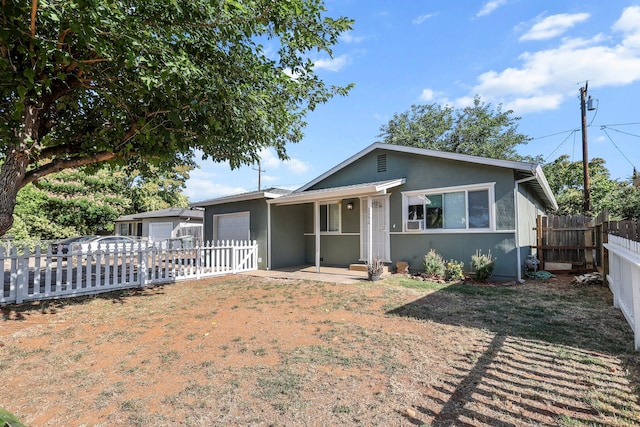 2092 Phobos Ct, Redding, CA 96002 - ranch-style house with an attached garage and stucco siding