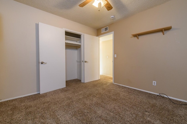 6781 Reflection St, Redding, CA 96001 - unfurnished bedroom with carpet floors, a textured ceiling, a ceiling fan, and a closet