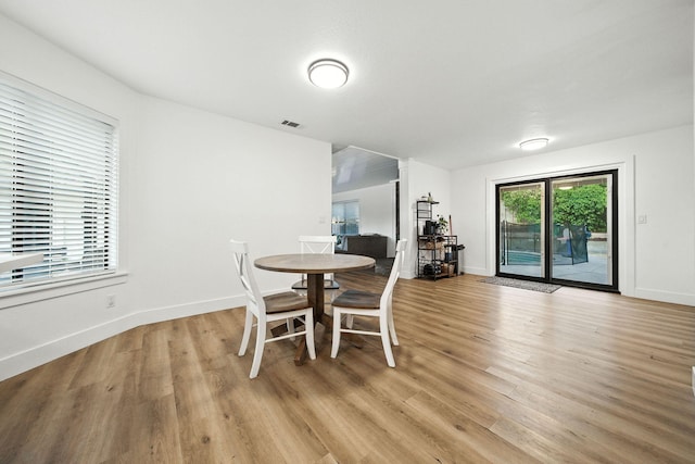 1683 Lakeside Dr, Redding, CA 96001 - dining room featuring light wood-style floors and baseboards