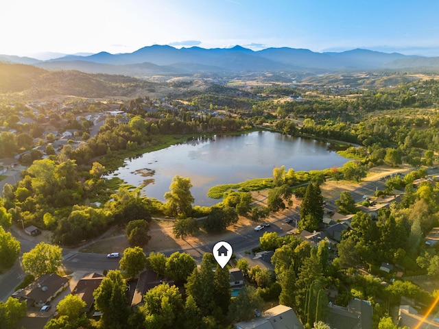 1683 Lakeside Dr, Redding, CA 96001 - drone / aerial view of a water and mountain view