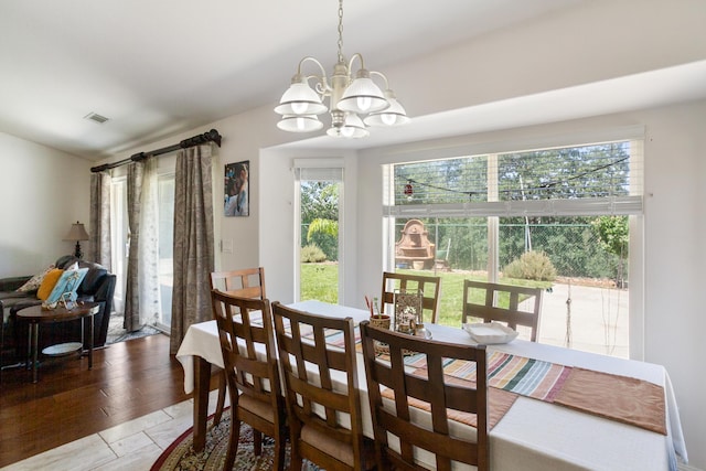 2834 Aspen Glow Ln, Redding, CA 96001 - dining space with a chandelier