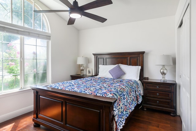 2834 Aspen Glow Ln, Redding, CA 96001 - bedroom with vaulted ceiling, dark wood-style flooring, a closet, and a ceiling fan