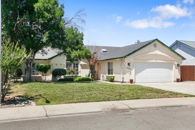 2834 Aspen Glow Ln, Redding, CA 96001 - ranch-style home featuring stucco siding, a garage, a front yard, and driveway
