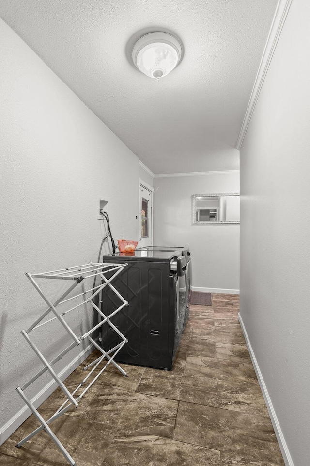 3428 Adams Ln, Redding, CA 96002 - washroom with separate washer and dryer, a textured ceiling, and ornamental molding