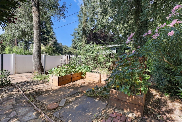 3428 Adams Ln, Redding, CA 96002 - view of patio / terrace with a garden