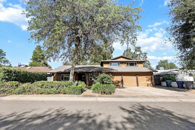 3428 Adams Ln, Redding, CA 96002 - view of front of house with driveway and a garage
