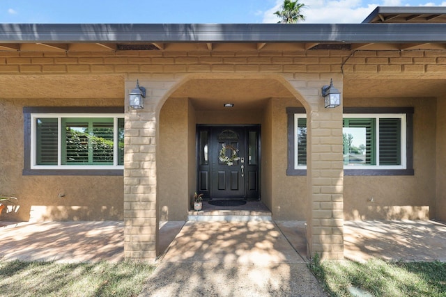 3428 Adams Ln, Redding, CA 96002 - view of exterior entry featuring stucco siding