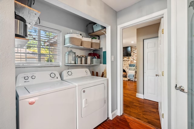2623 Freebridge St, Redding, CA 96001 - washroom featuring washing machine and clothes dryer and dark wood-style flooring