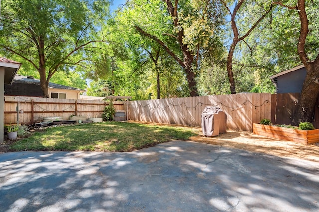2623 Freebridge St, Redding, CA 96001 - fenced backyard featuring a patio area