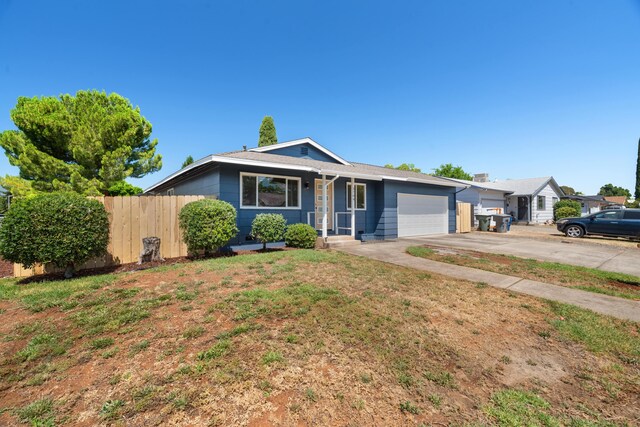 3704 Polaris Way, Redding, CA 96002 - ranch-style house with an attached garage and driveway