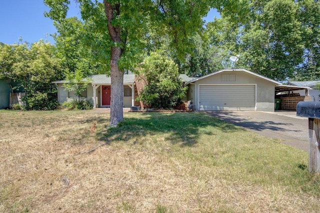 2308 Hawn Ave, Redding, CA 96002 - ranch-style house featuring a garage, concrete driveway, and a front lawn