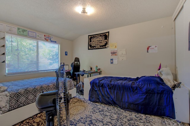 2308 Hawn Ave, Redding, CA 96002 - bedroom with lofted ceiling and a textured ceiling