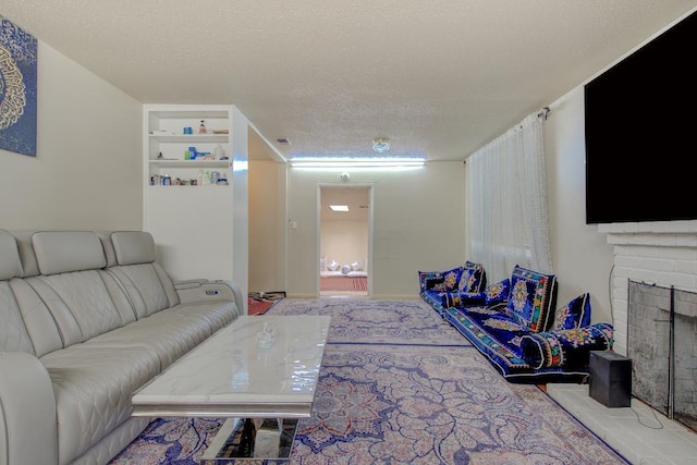 2308 Hawn Ave, Redding, CA 96002 - carpeted living room with a textured ceiling and a fireplace
