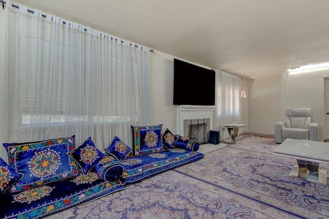 2308 Hawn Ave, Redding, CA 96002 - living room featuring a textured ceiling and a brick fireplace