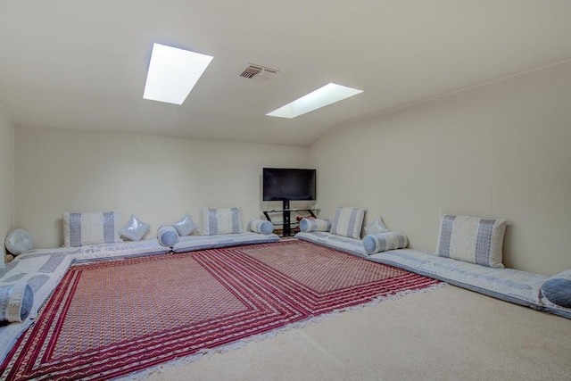 2308 Hawn Ave, Redding, CA 96002 - living area featuring a skylight, carpet floors, and lofted ceiling