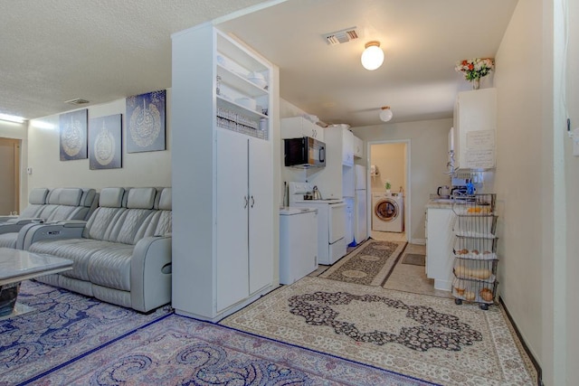 2308 Hawn Ave, Redding, CA 96002 - living room with washer / clothes dryer