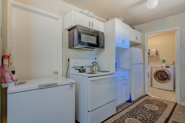 2308 Hawn Ave, Redding, CA 96002 - kitchen featuring white appliances, separate washer and dryer, light countertops, and white cabinets