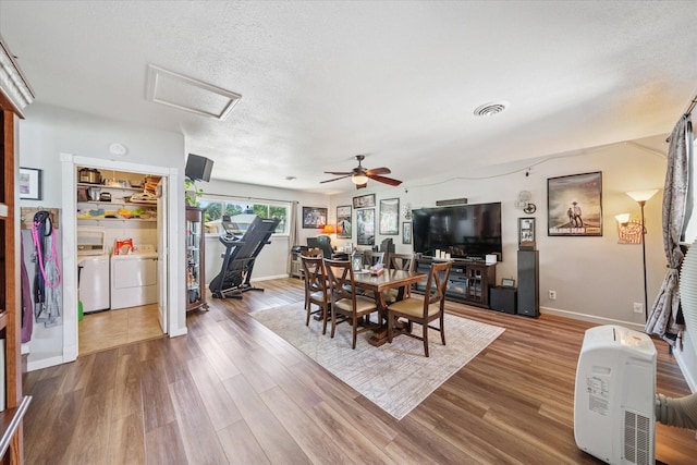 2912 Squire Ave, Redding, CA 96002 - dining room with washing machine and dryer, attic access, wood finished floors, ceiling fan, and a textured ceiling