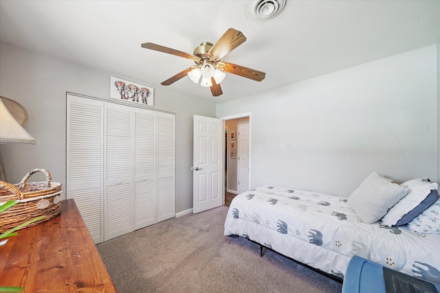 2912 Squire Ave, Redding, CA 96002 - bedroom with carpet, a closet, and ceiling fan