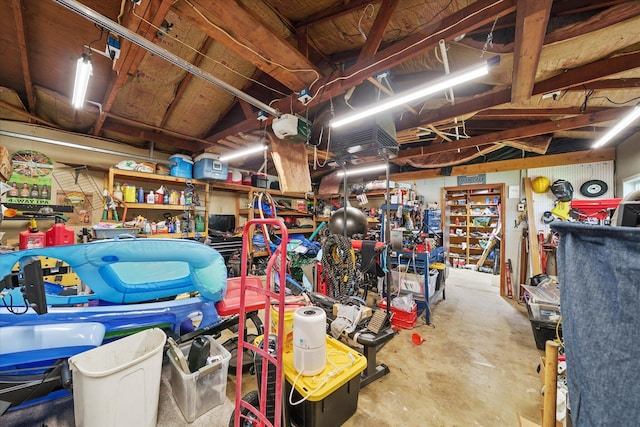 2912 Squire Ave, Redding, CA 96002 - garage with a garage door opener and a workshop area