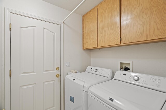 4592 Impression Way, Shasta Lake, CA 96019 - laundry area featuring cabinet space and independent washer and dryer