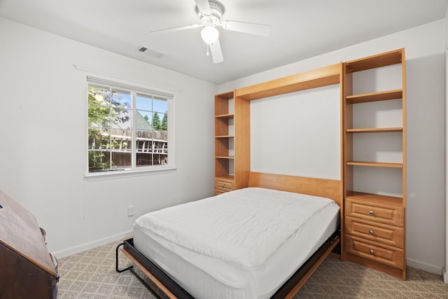 4592 Impression Way, Shasta Lake, CA 96019 - carpeted bedroom with baseboards and a ceiling fan