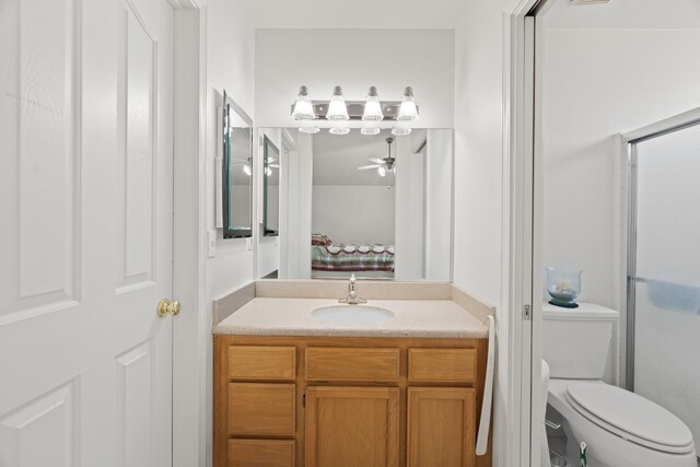 4592 Impression Way, Shasta Lake, CA 96019 - ensuite bathroom featuring vanity, a shower with door, and a ceiling fan