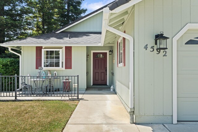 4592 Impression Way, Shasta Lake, CA 96019 - property entrance featuring a shingled roof