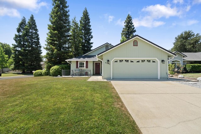 4592 Impression Way, Shasta Lake, CA 96019 - ranch-style home with an attached garage, driveway, and a front lawn