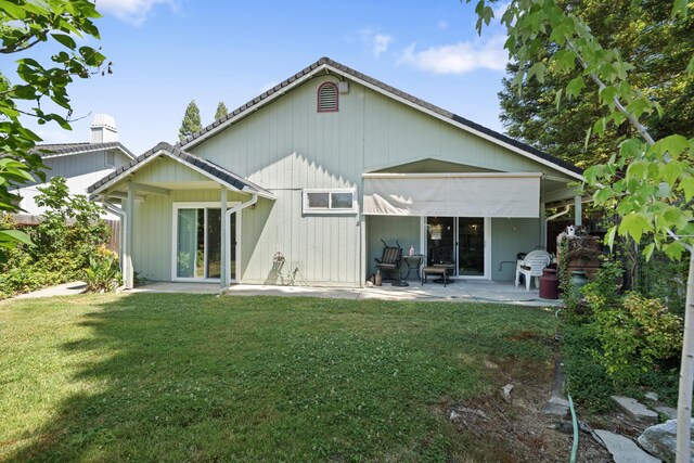 4592 Impression Way, Shasta Lake, CA 96019 - back of property with a patio area and a lawn