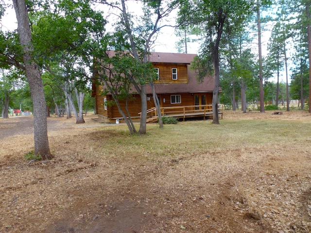 29119 Day Rd, Mcarthur, CA 96056 - back of property with a wooden deck and roof with shingles