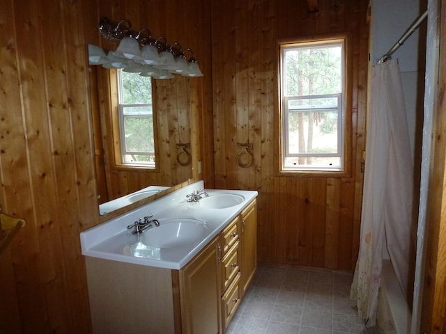 29119 Day Rd, Mcarthur, CA 96056 - bathroom with plenty of natural light, wooden walls, double vanity, and a shower with curtain