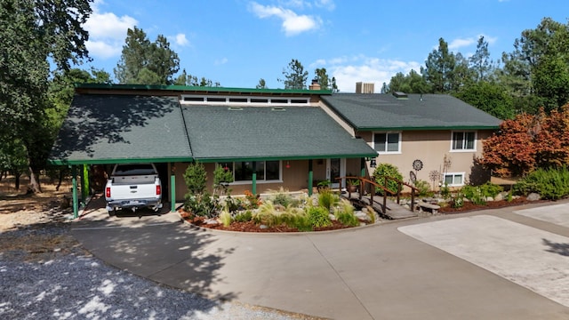 6949 Rector Creek Rd, Igo, CA 96047 - view of front of property featuring a carport, concrete driveway, and a chimney