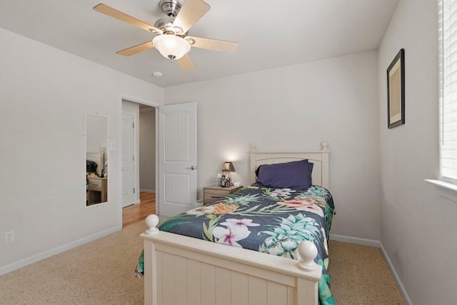 6949 Rector Creek Rd, Igo, CA 96047 - carpeted bedroom with baseboards and a ceiling fan