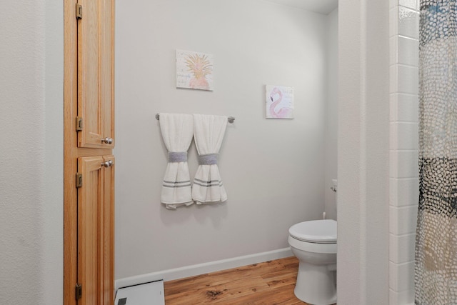 6949 Rector Creek Rd, Igo, CA 96047 - bathroom with wood finished floors and curtained shower