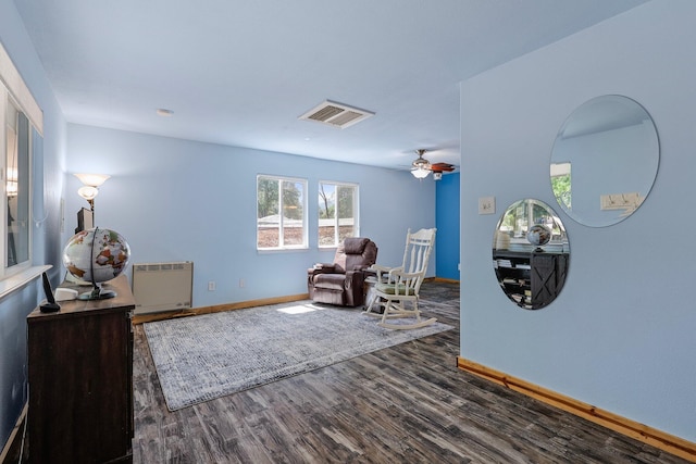 6949 Rector Creek Rd, Igo, CA 96047 - sitting room with radiator heating unit, dark wood-style flooring, and ceiling fan