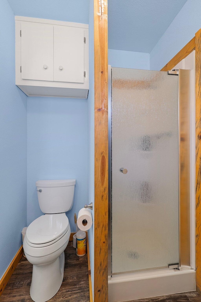 6949 Rector Creek Rd, Igo, CA 96047 - bathroom with a shower stall and wood finished floors