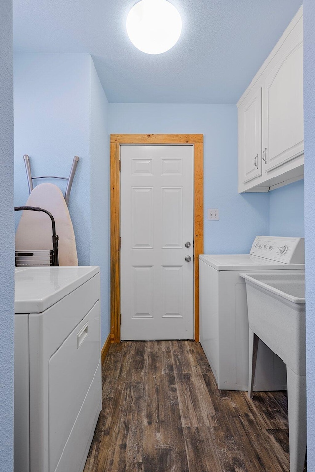 6949 Rector Creek Rd, Igo, CA 96047 - laundry room featuring cabinet space, washer and clothes dryer, and dark wood-style floors