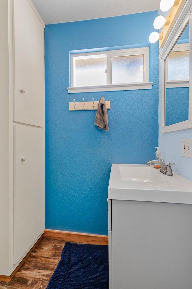 6949 Rector Creek Rd, Igo, CA 96047 - bathroom featuring wood finished floors and vanity
