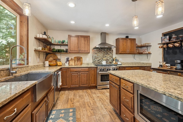 8637 Savannah Way, Shingletown, CA 96088 - kitchen with open shelves, wall chimney exhaust hood, stainless steel appliances, brown cabinets, and recessed lighting