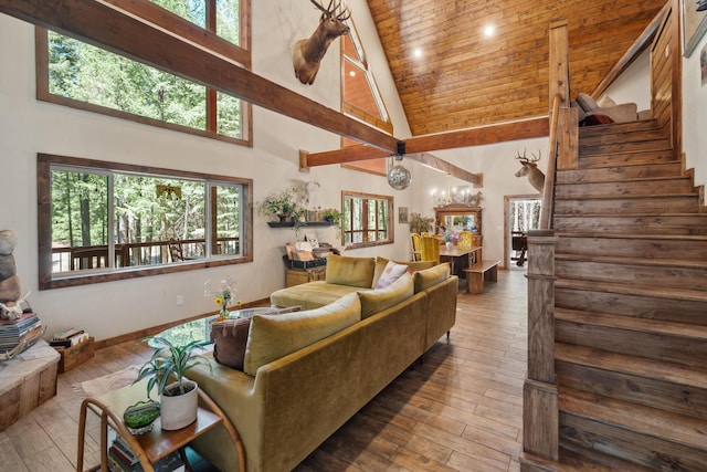 8637 Savannah Way, Shingletown, CA 96088 - living room featuring high vaulted ceiling, wood-type flooring, plenty of natural light, stairs, and wooden ceiling