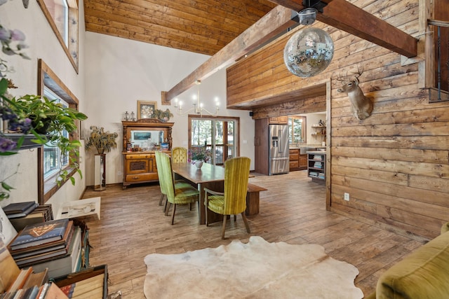 8637 Savannah Way, Shingletown, CA 96088 - dining space with light wood-type flooring, high vaulted ceiling, and a wood ceiling with exposed beams