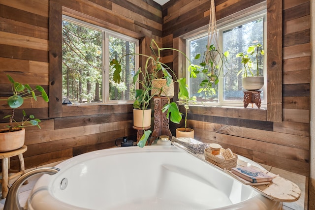 8637 Savannah Way, Shingletown, CA 96088 - bathroom featuring wooden walls, a bath, and healthy amount of natural light